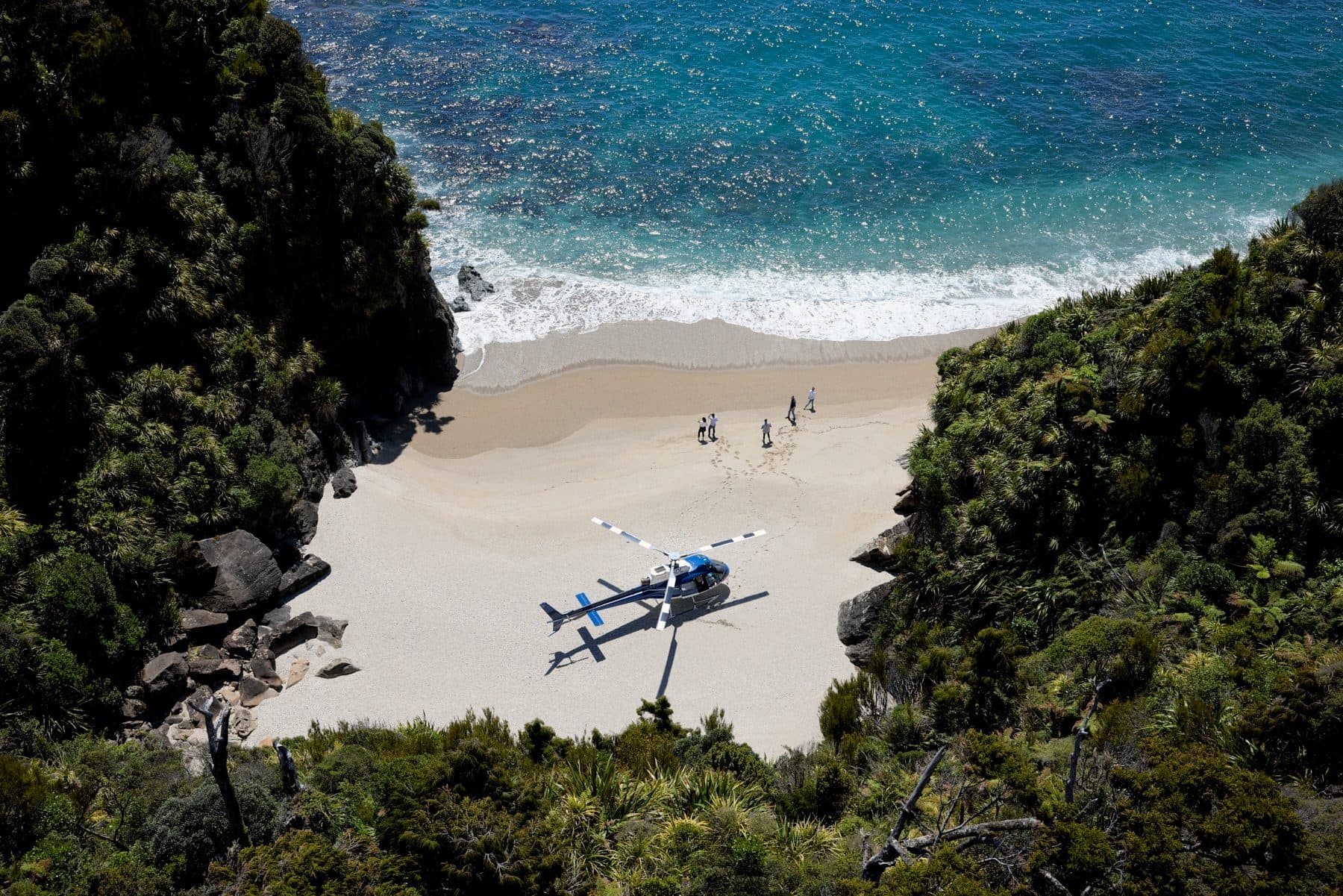 A helicopter landed on a remote cove on the South Westland coast